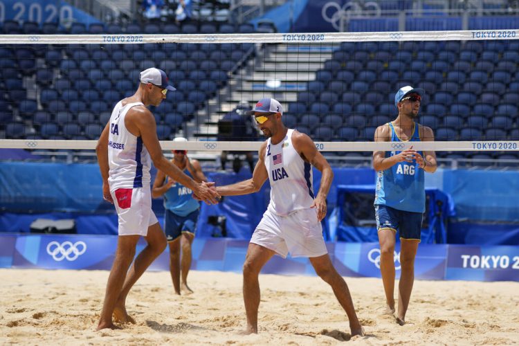 From partial isolation, U.S. beach volleyball team moves on